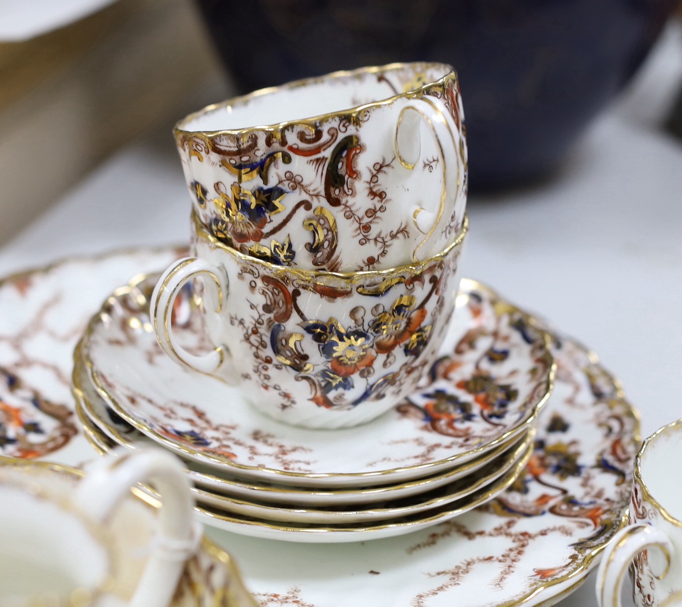 A 'Sylvan' pattern tea service, spiral fluted with cobalt blue, rose and gilt decoration (40 pieces)